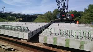 Precast section for concrete bridges