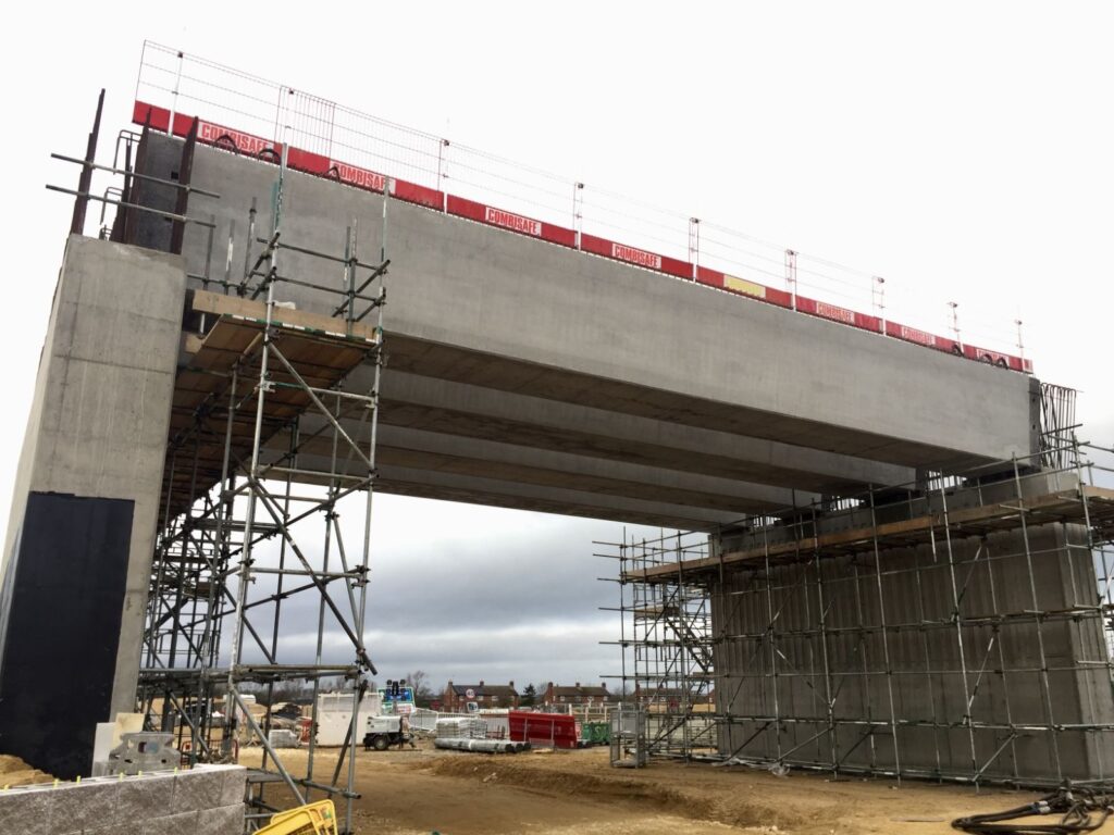 image showing the erection of a standard precast beam bridge 