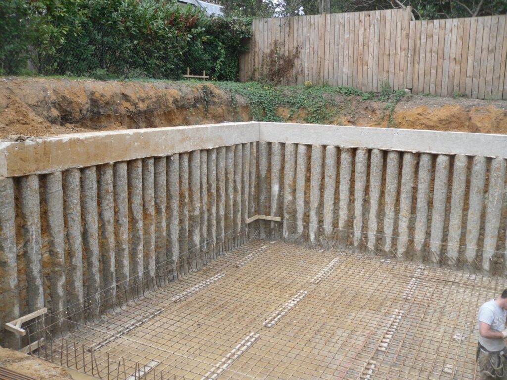 image showing a contigous pile embedded retaining wall 